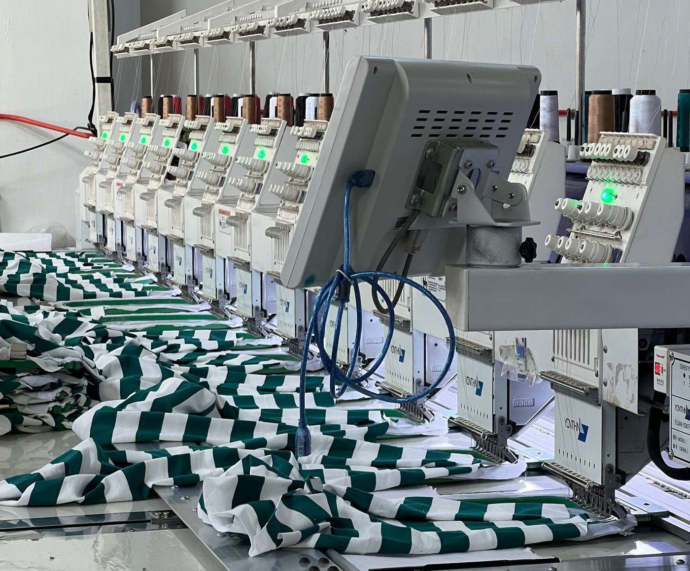 Multi-head embroidery machine