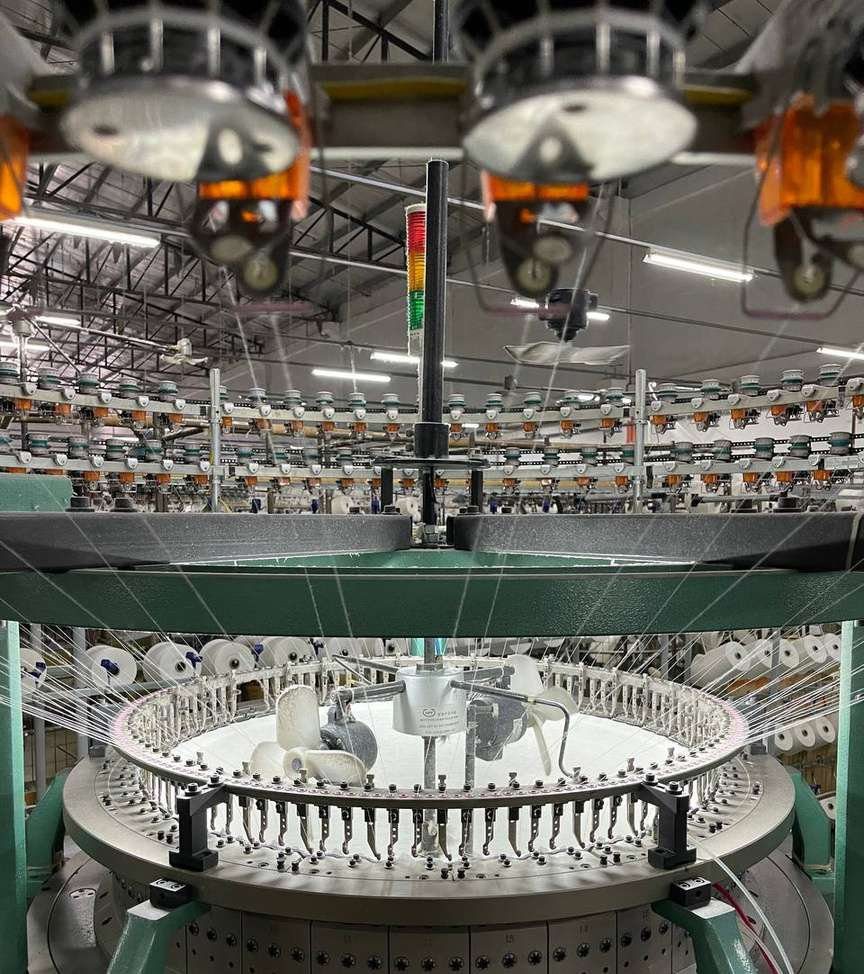Circular knitting machines producing fabric in-house